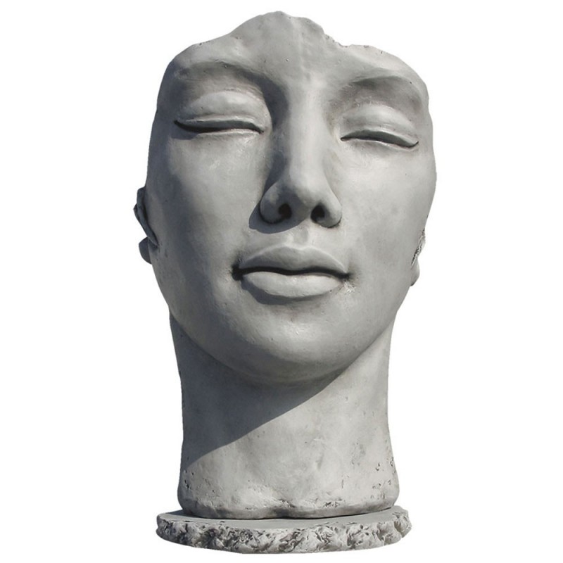 Visage en pierre reconstituée Visage en pierre reconstituée